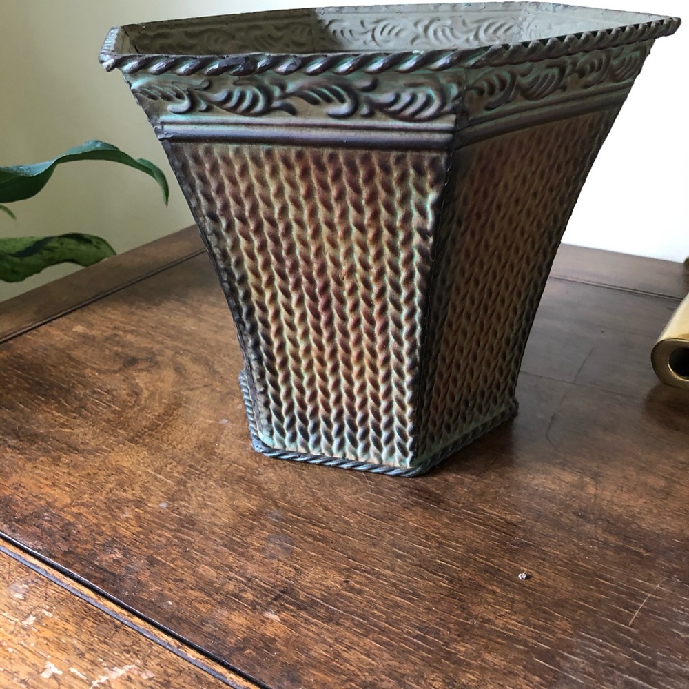 Nicely textured metal container.